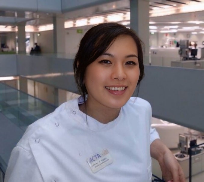 A person in a white coat AI-generated content may be incorrect.